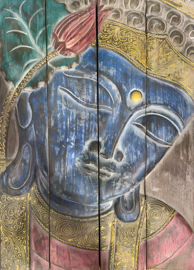 Buddha-Gesicht auf Holz